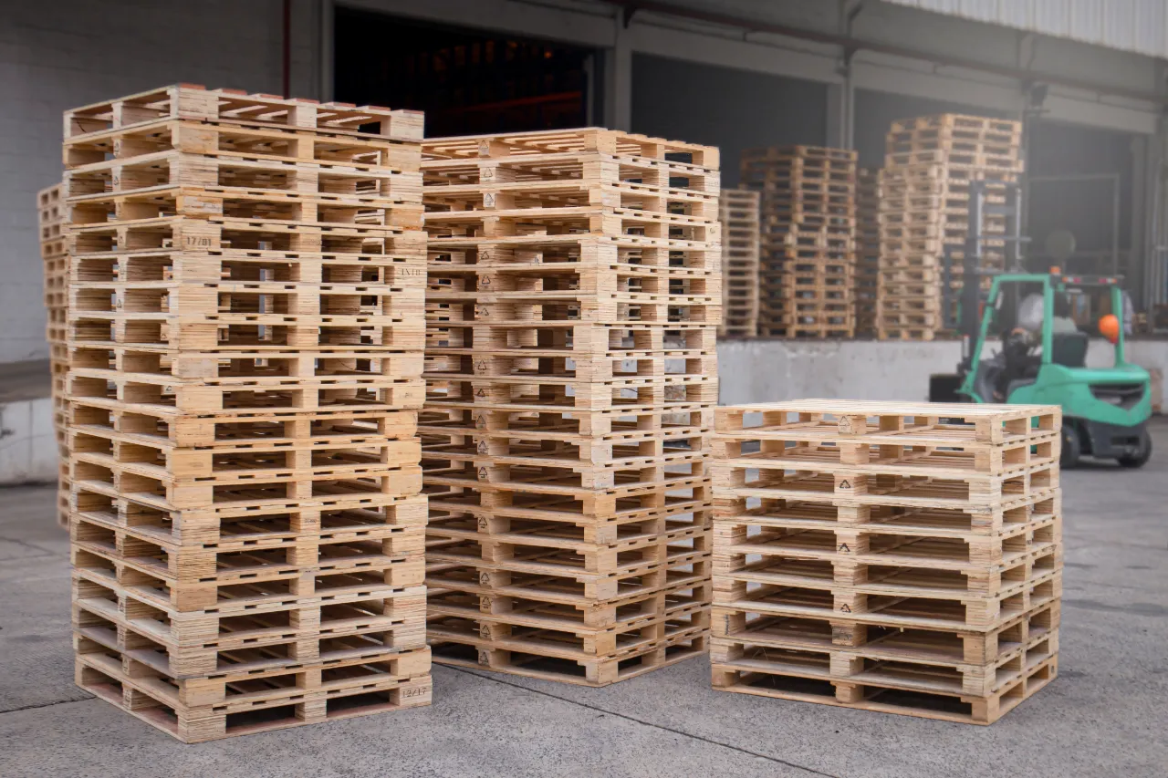 Stacks of wooden pallets in a warehouse