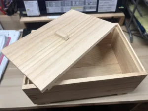 Ornamental pine wood box with recessed lid